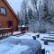 BC Log cabin with private beach river fire pit AC wifi onsite trails ski slope views