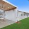 The Elements l Earth l 4 Stunning Apartments each with Private Outdoor Dining l Walk to the Beach l Event Friendlyl Wifi l Netflix l Outdoor Shower l Communal BBQ Pavilion and Lawn Area l