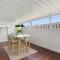 The Elements l Earth l 4 Stunning Apartments each with Private Outdoor Dining l Walk to the Beach l Event Friendlyl Wifi l Netflix l Outdoor Shower l Communal BBQ Pavilion and Lawn Area l