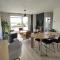IMMODREAMS - LAttik with lake views and 80m2 terrace