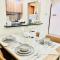 Stay at Al Ghaimah Holiday Homes 1 Bedroom Apartment Near Airport