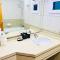 Stay at Al Ghaimah Holiday Homes 1 Bedroom Apartment Near Airport