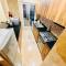 Stay at Al Ghaimah Holiday Homes 1 Bedroom Apartment Near Airport