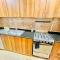 Stay at Al Ghaimah Holiday Homes 1 Bedroom Apartment Near Airport