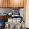 Stay at Al Ghaimah Holiday Homes 1 Bedroom Apartment Near Airport