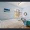 Beachfront Villa by Peppy Beach Retreats®