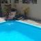 Casa dos Hibiscos com piscina e ar condicionado. - Florianópolis