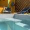 Case Oiseaux de paradis avec piscine