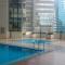 BGC - Two Bedroom Condo with Game Room high speed WiFi - Маніла