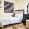 Affordable 2 Bed Condo Rental in Davao City with Wifi & Netflix, Swimming Pool, Gym & Billiard Hall