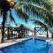 Villa Devonia - Beachfront Cabins with Pool at Tela, HN - Tela