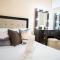 Affordable 2 Bed Condo Rental in Davao City with Wifi & Netflix, Swimming Pool, Gym & Billiard Hall