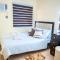 Affordable 2 Bed Condo Rental in Davao City with Wifi & Netflix, Swimming Pool, Gym & Billiard Hall