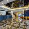 Lano Hotel Zhenjiang South High-speed Railway Station Baolong Plaza