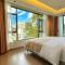 Lijiang Painted Mountain Cloud House Boutique B&B - ليجيانغ