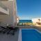 Dolphin view with a pool by the beach