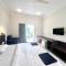 Morjim Sunset Guesthouse- Apartments with Kitchen & AC Rooms