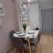 Eclectic Studio with Stone
