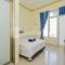 Grand Kencana Guesthouse near Wisata Bahari Lamongan Mitra RedDoorz - Paciran