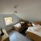 Ferienwohnung mit Balkon DG