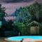 Gîte Kaz à Topaze, piscine, jardin tropical