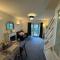 Comfortable Home away from Home, spacious 2 bedroom town house,self catering, free parking, walking distance to Cheltenham town centre