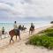 3 SUITES AT BLUE PAVILION - 3 KITCHENS - Steps to BEACH - Car, Value, Service