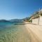 Agoritsa Beachfront Apartment with its own pontoon - Nydri