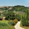 Tuscan Sun With Shared Pool - Happy Rentals