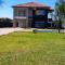 Executive 4 bedroom house with 4 beds .
