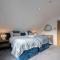Stylish beachside house with superb coastal views