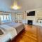 Timeless Tudor w/ Game Room, Pool Table & Hot Tub