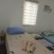 Niana’s Place 2BR w Garden, Internet, Netflix - Legazpi