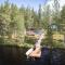 Holiday home with outdoor Jacuzzi and Sauna