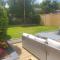 Modern open plan house, sea views and hot tub