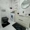 Stylish Apartment Getaway with self check-in and free parking lot - أراد