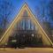Modern A-frame in woods' embrace with a Hot Tub Modern A-frame in woods' embrace with a Hot Tub
