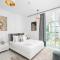 Nasma Luxury Stays - Sleek City Haven 1BR in Dubai's Glitz Residence 3 - Dubaj