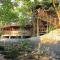 Riverside villa in tropical setting