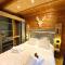 LE RENNE Chalet en bois au calme avec SPA Jacuzzi - لابريس