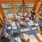 Enjoy this stunning Log home with open floor plan and tons of natural lighting Ridgetop