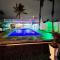 Linda Casa de praia com Super piscina 12x5 Novinha com 3 níveis, Wi-Fi, Tv led,jardim , churrasqueira completa - 伊塔尼亚恩