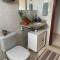 1 quarto 1 cama queen size banheiro privativo- ap compartilhado - ألفيناس