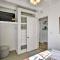 Sand Pebbles: Bright Bungalow - Steps to Beach!