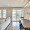 Oak Island Coastal Home with Covered Deck!