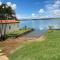 Casa à beira lago de Furnas. (Pé na água) - Formiga