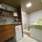 STUDIO aconchego, com Ar, Wifi, Smartv e Cozinha
