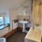 Cosy modern cottage by the sea, heart of snowdonia