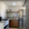Apartamento climatizado ao lado do Premium Hosp.