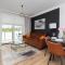 Modern Apartment with Balcony and Parking in Gdańsk by Noclegi Renters